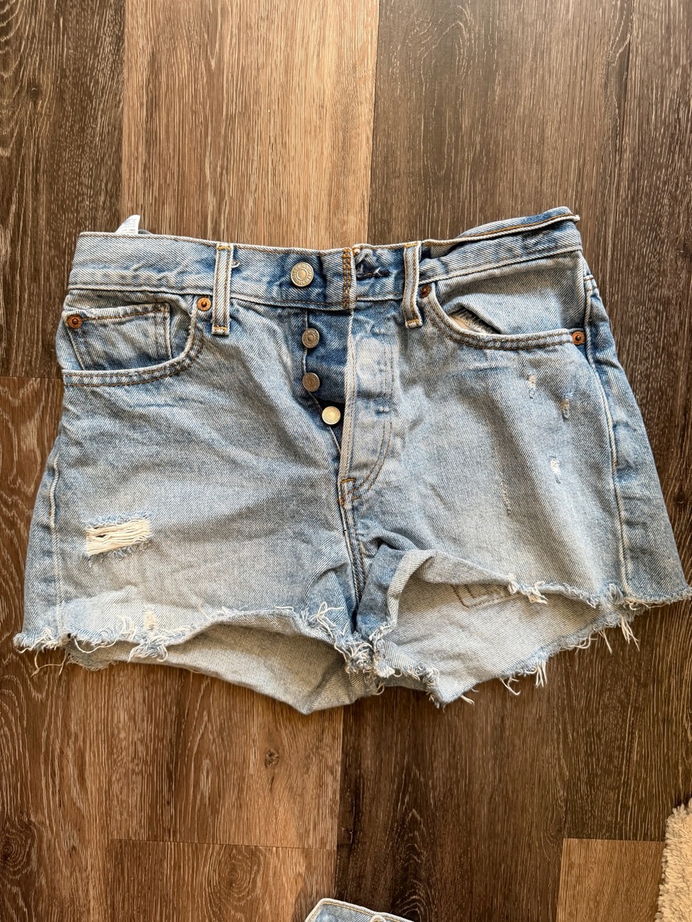 High-Rise Distressed Levi’s Denim Shorts - Light Blue